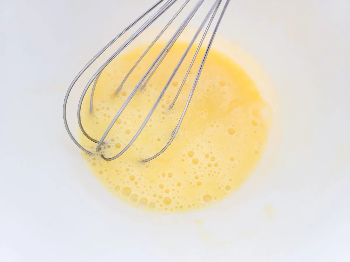 egg whisked until frothy.