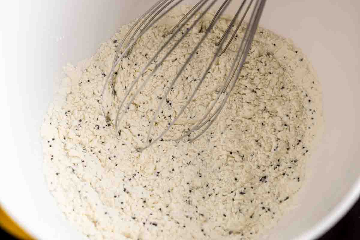 dry muffin ingredients mixed in a bowl.