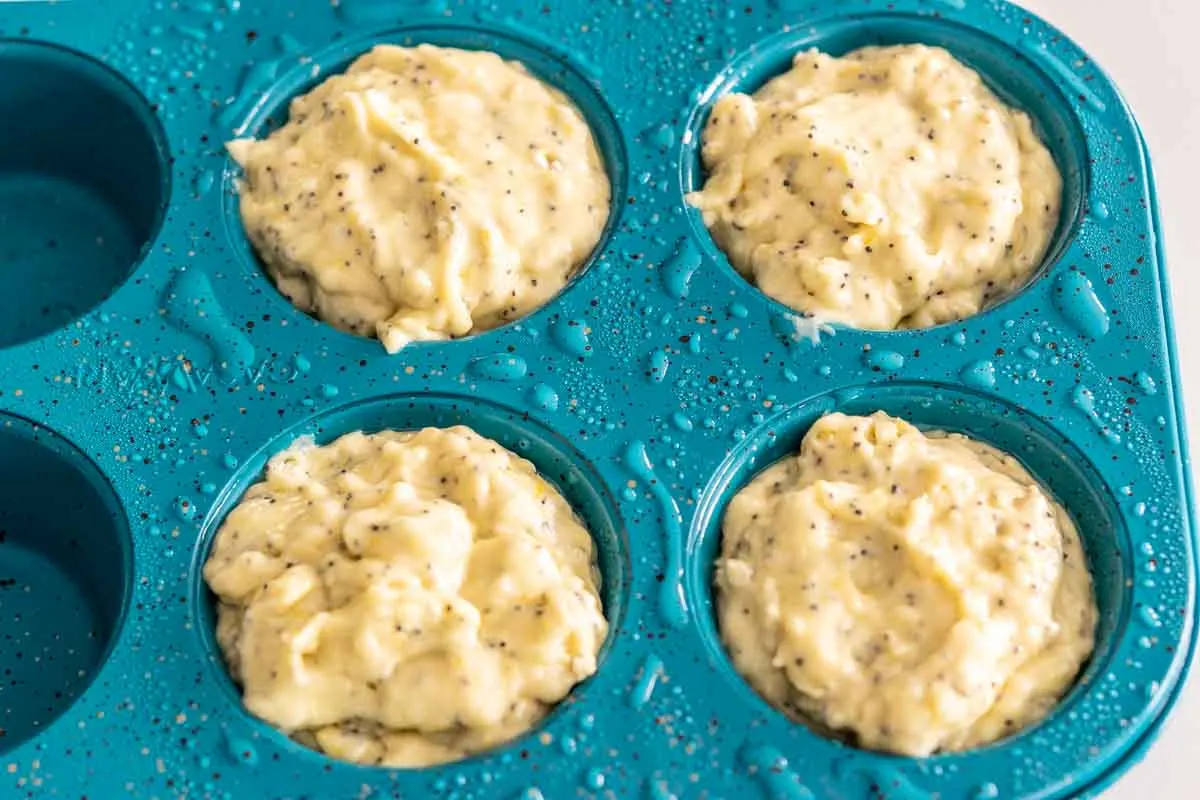 muffin batter in 4 cups of a muffin pan.