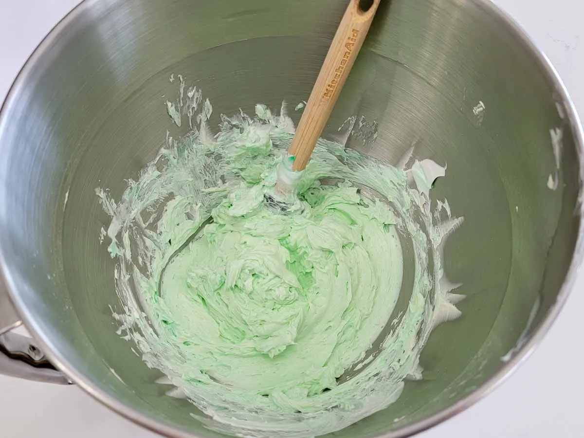 green cheesecake filling mixed in a bowl.