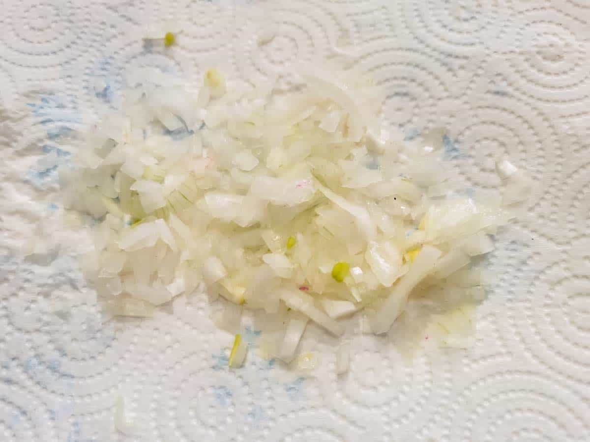 finely diced onion drying on paper towel.