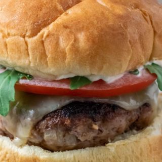 a turkey burger on parchment paper.