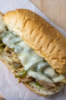 Philly Cheese Chicken on parchment paper.