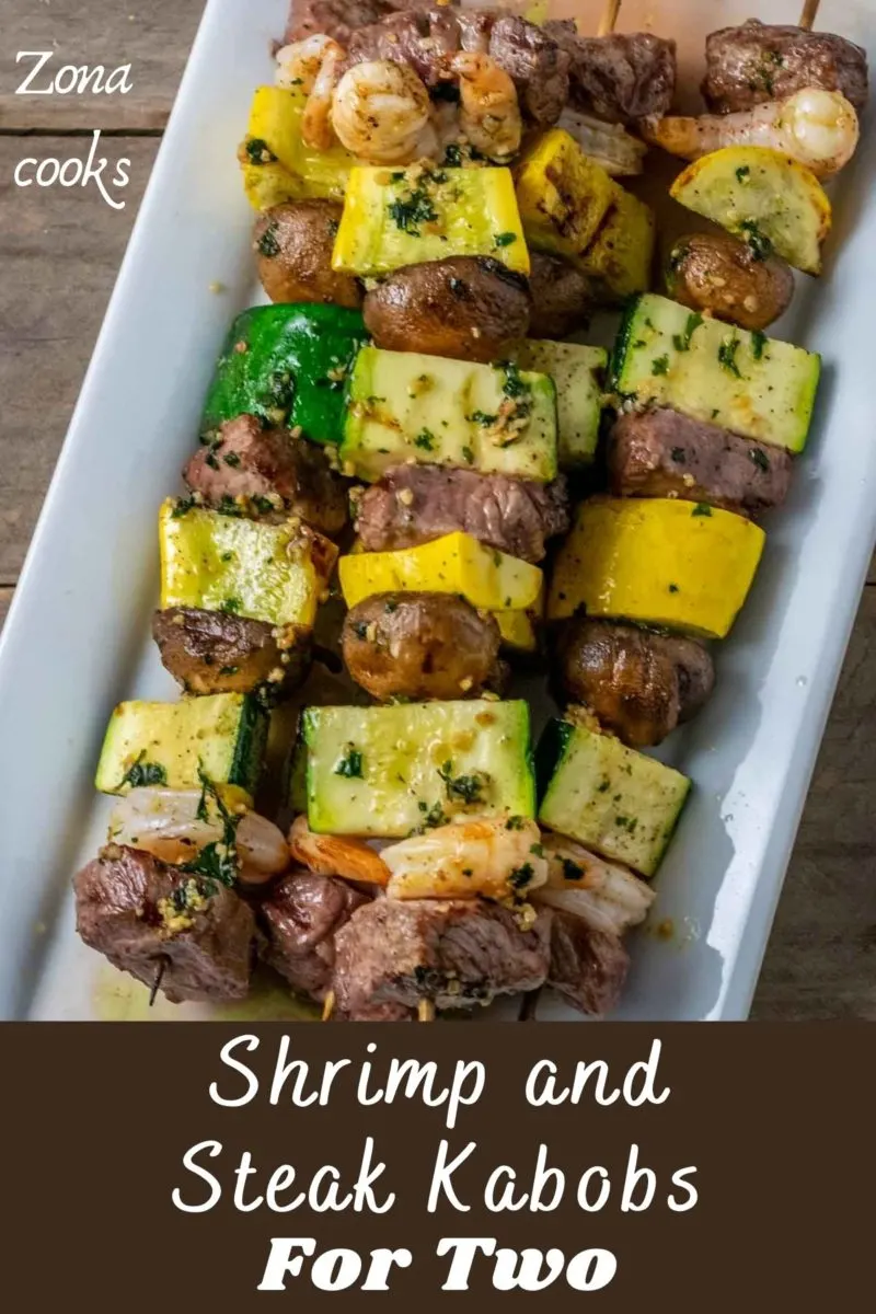 Shrimp and Steak Skewers on a plate.