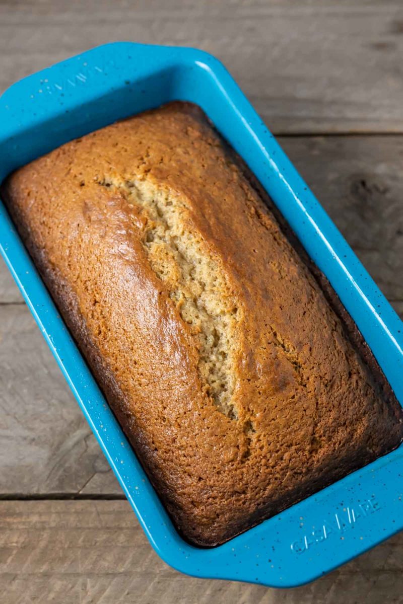 a loaf of banana bread in a loaf pan.