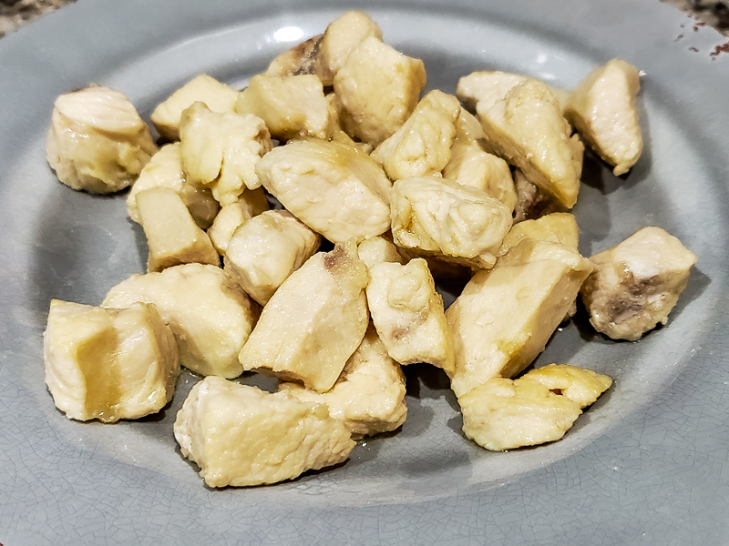 diced cooked chicken on a plate.