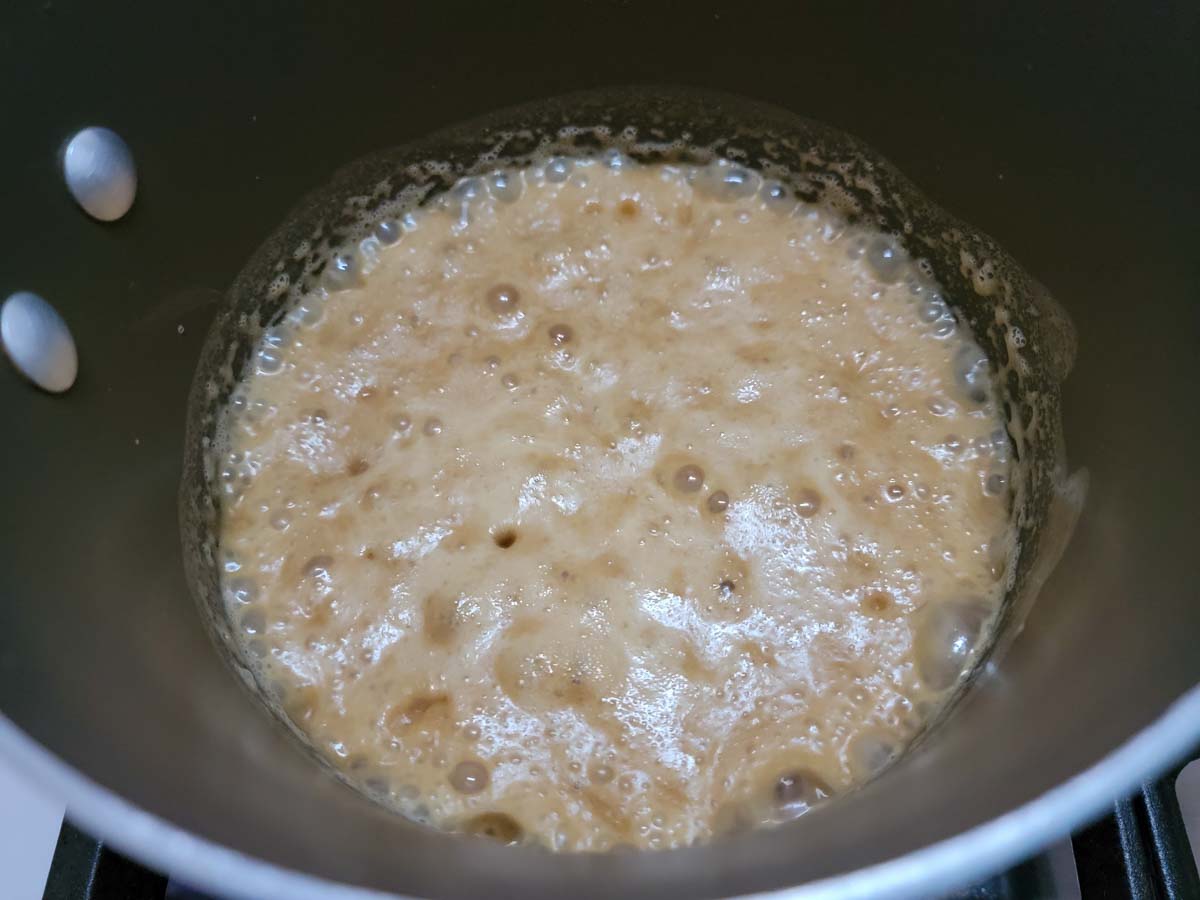 butter and peanut butter cooking in a pan.