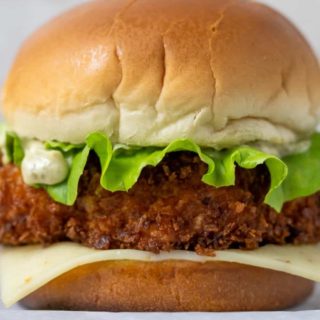 Fried Shrimp Burger on parchment paper.