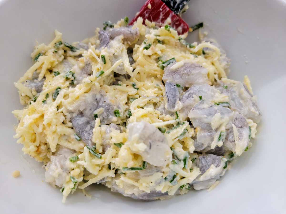 shrimp and cheese mixture in a bowl.