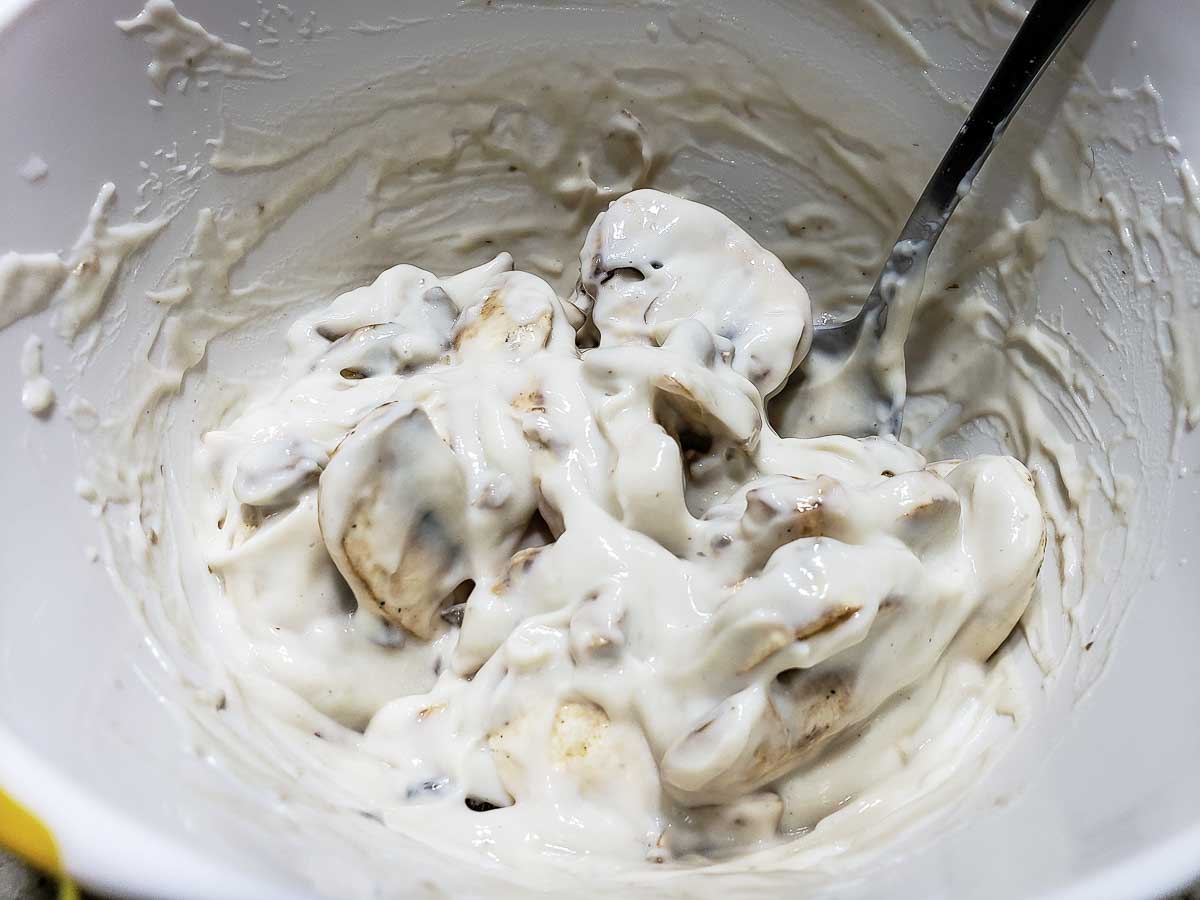 cream of mushroom gravy mixed in a bowl.
