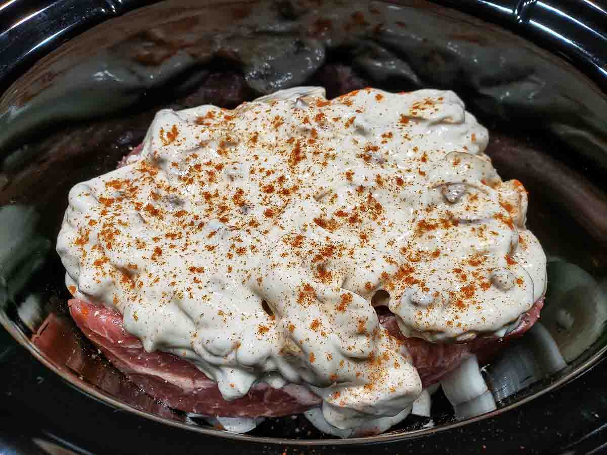 paprika sprinkled on mushroom gravy and Country Style Ribs in the Crock Pot.