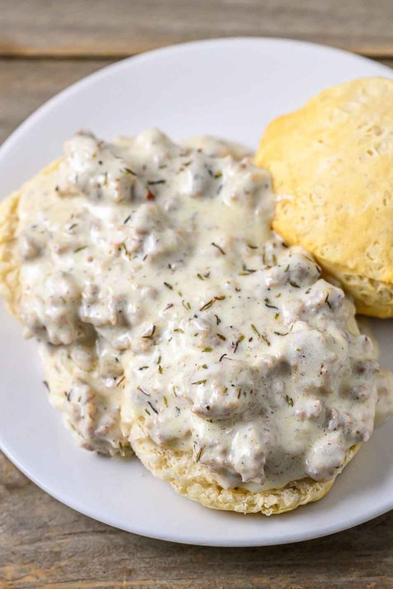 Old Fashioned Biscuits and Gravy on a plate.