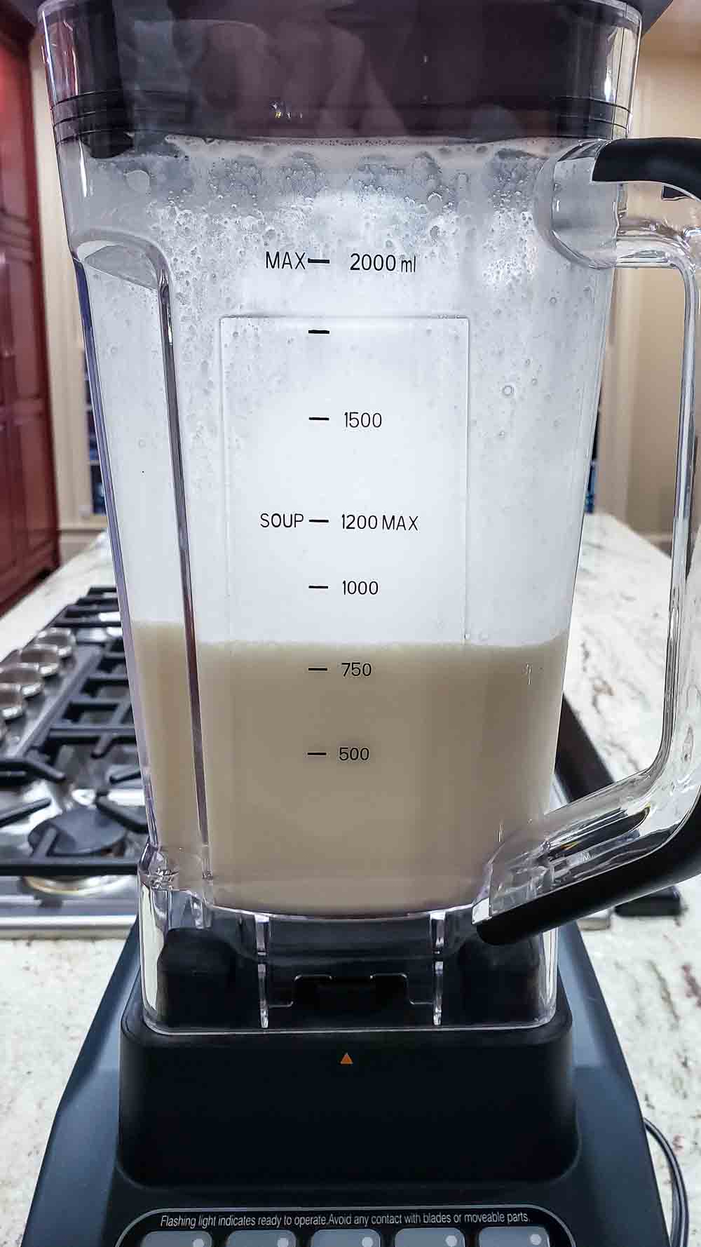 frozen orange drink blended in a blender.