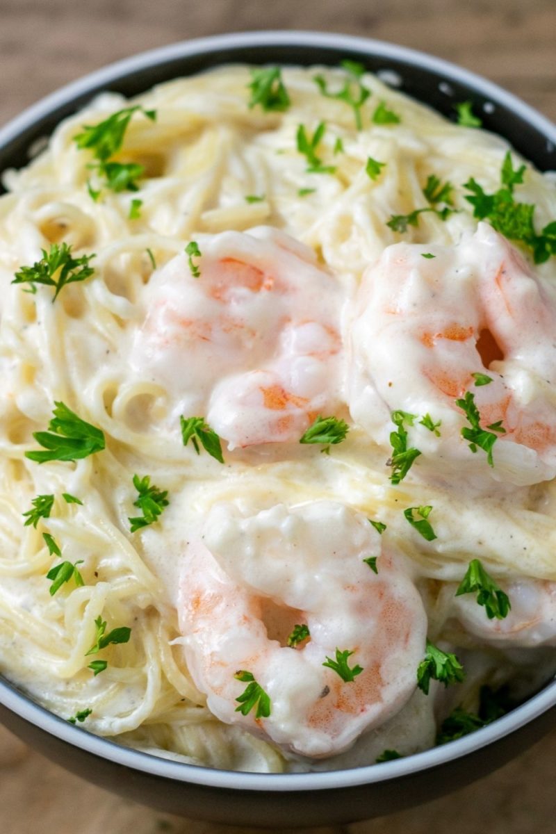 Shrimp Alfredo with Angel Hair Pasta in a bowl.