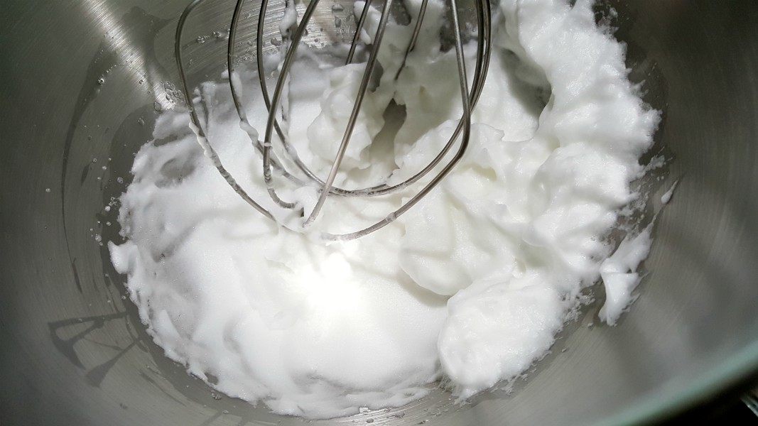 egg whites whisked into stiff peaks.