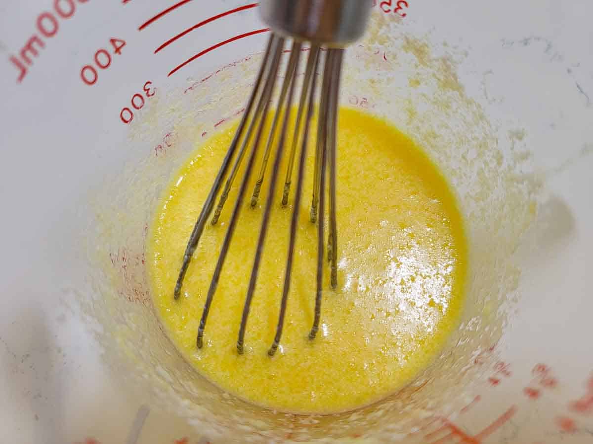 egg whisked into buttermilk.