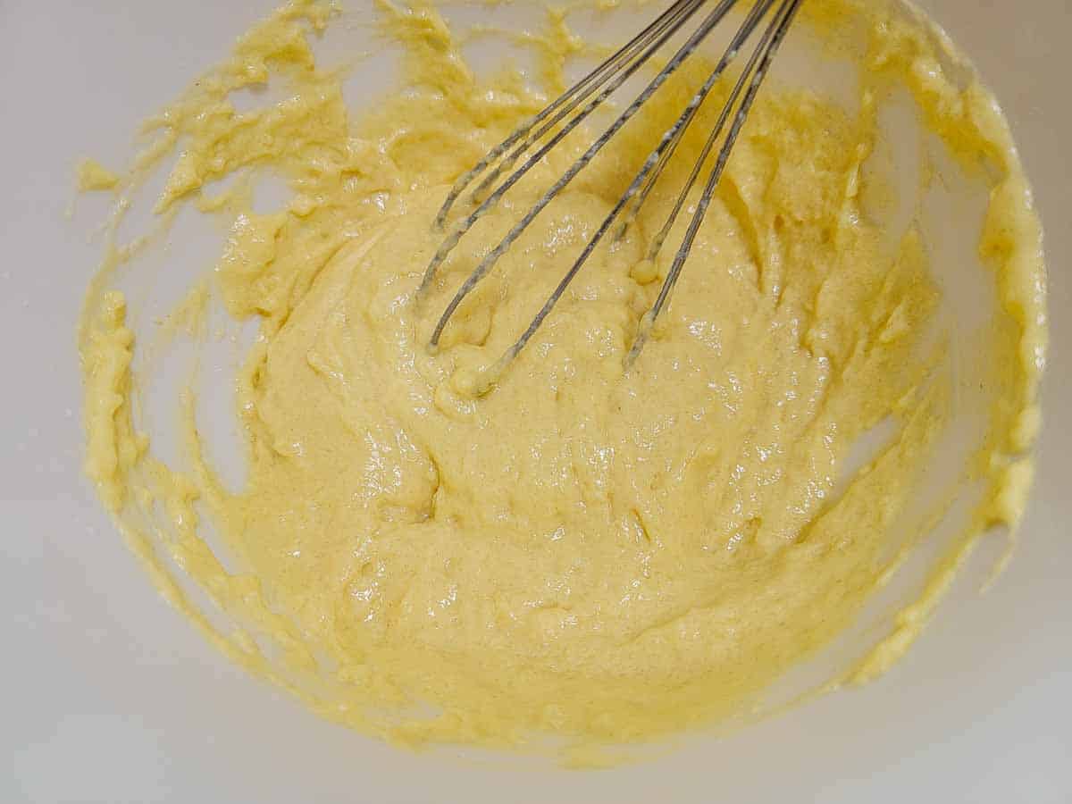 thick batter whisked in a bowl.