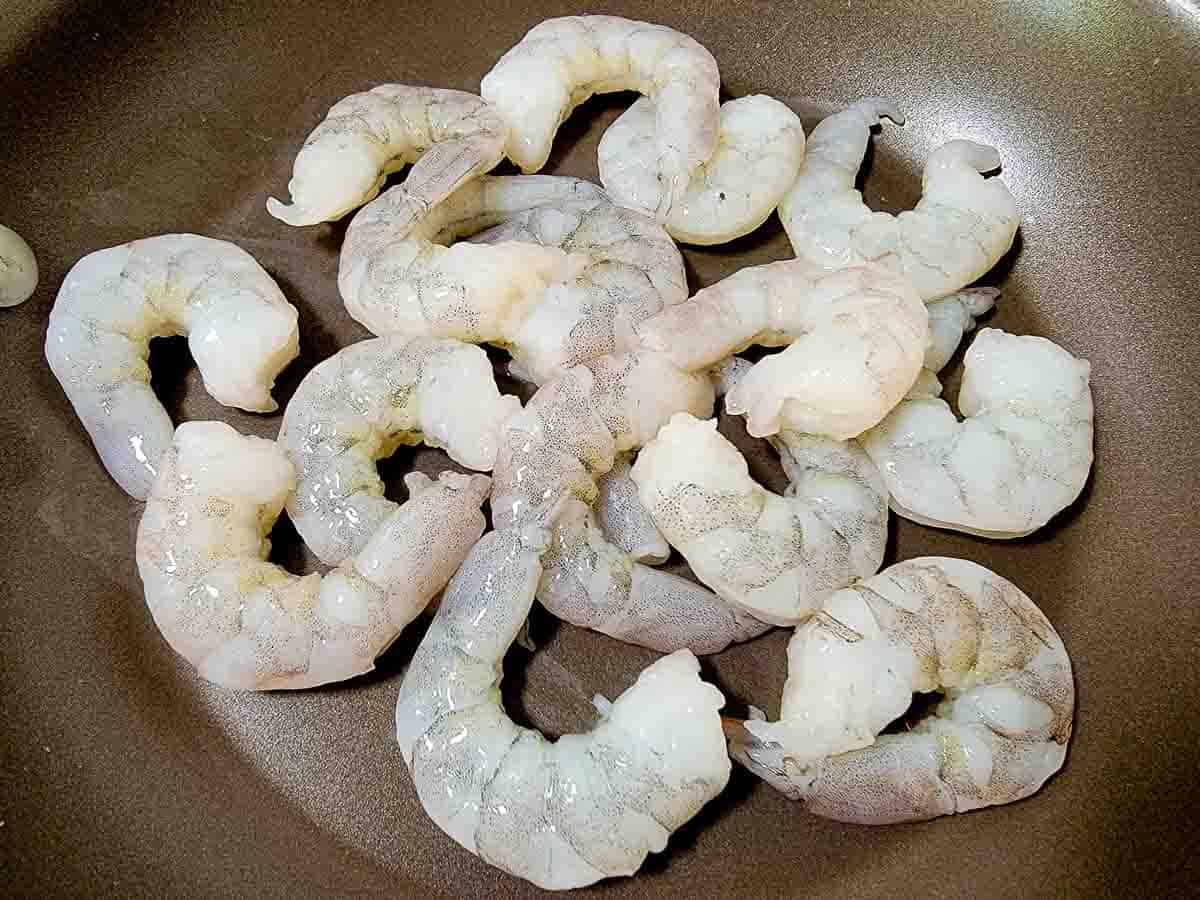 shrimp cooking in a pan.