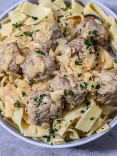 Homemade Swedish Meatballs with Egg noodles for two in a bowl.
