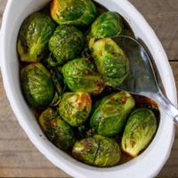 Marinated Brussels Sprouts in a casserole dish.