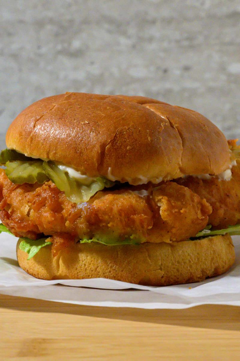 Crispy Buttermilk Chicken Sandwich on parchment paper.