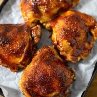 Oven BBQ Chicken Thighs on a sheet pan.