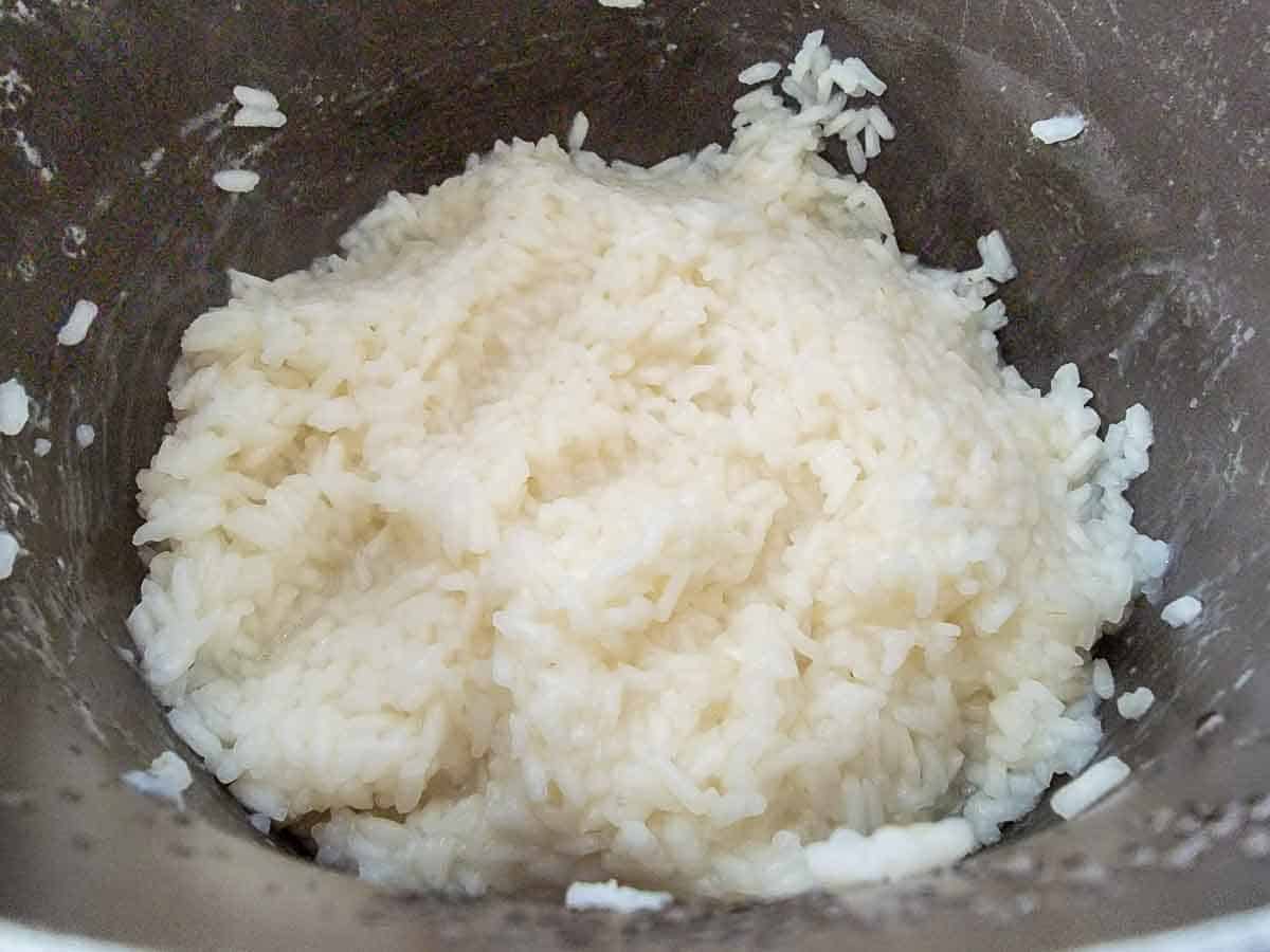white rice cooking in a sauce pan.