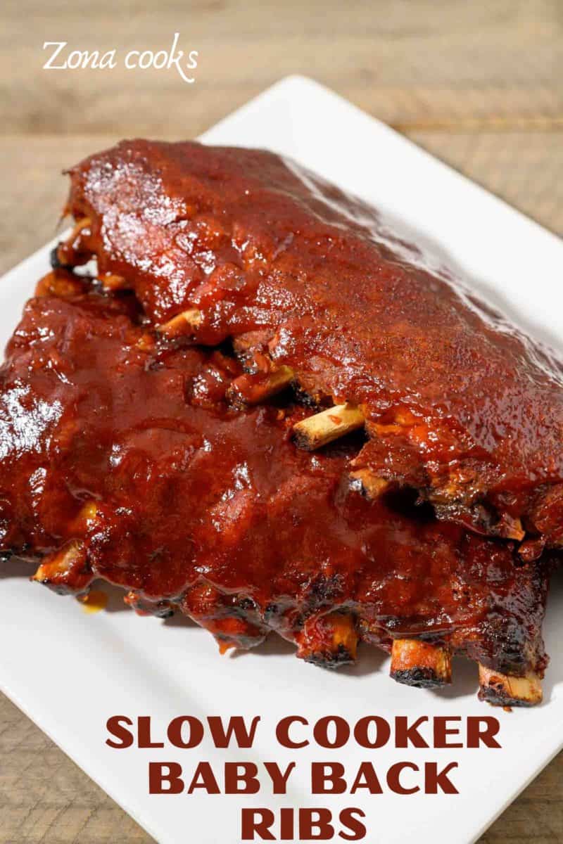 BBQ Ribs Slow Cooker with two slabs of ribs on a plate.