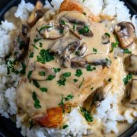 Pan Fried Pork Chops with Gravy on a plate.