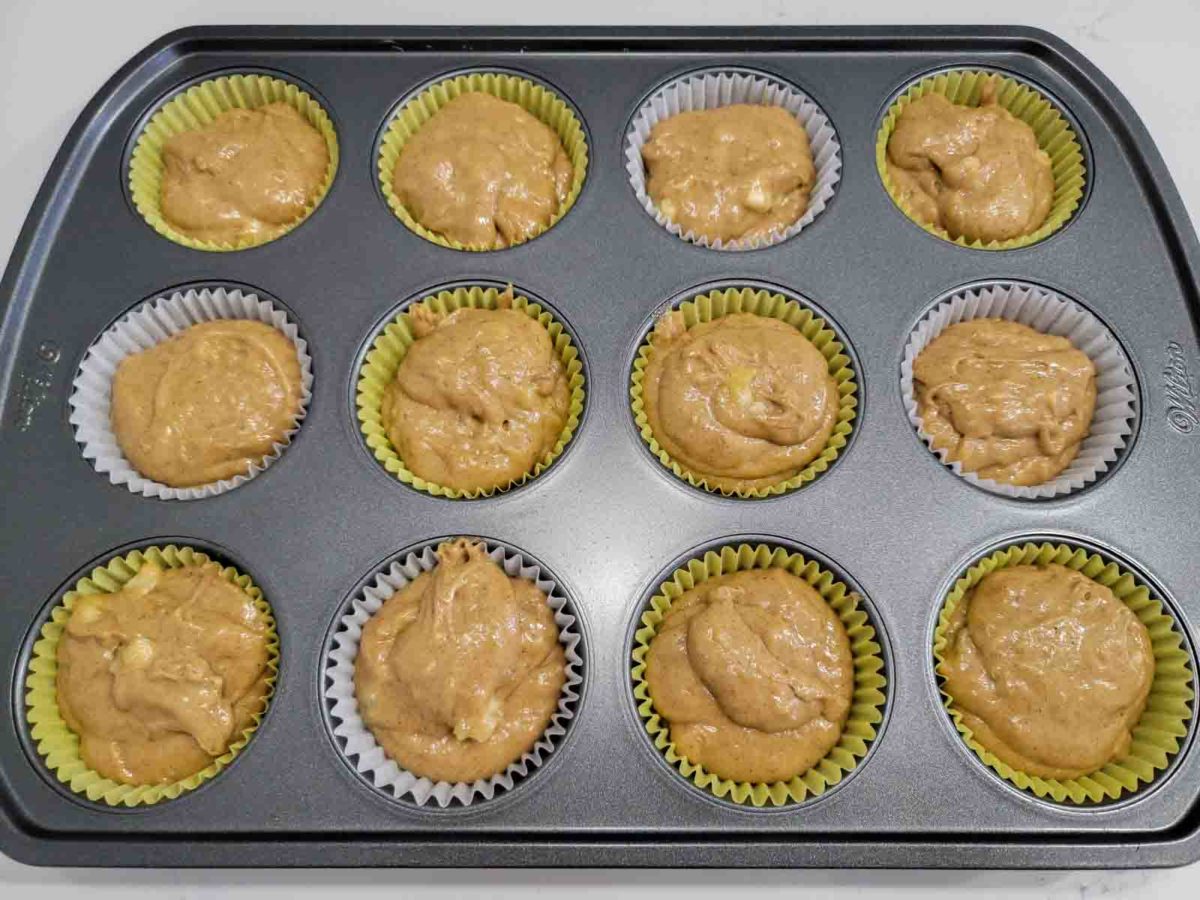 3 ingredient banana muffin batter in a muffin tin.
