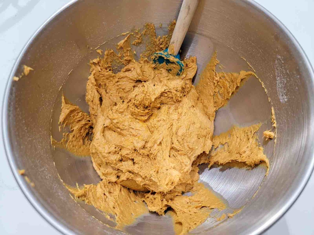 pumpkin muffin batter in a bowl.