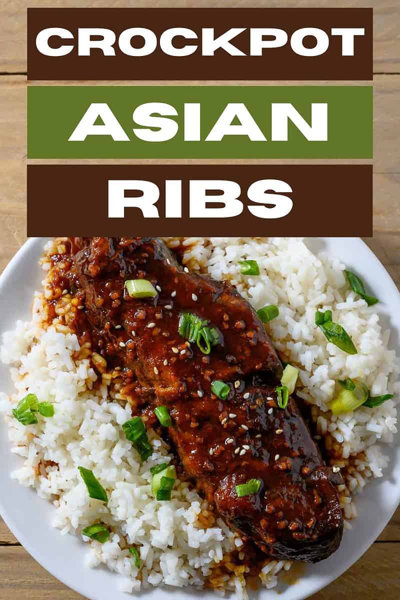 Crockpot Asian Ribs over rice on a plate.