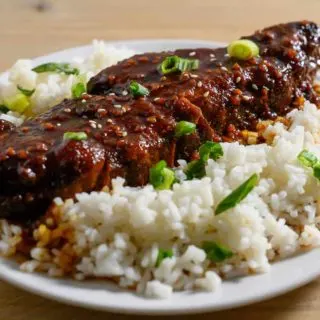 Slow Cooker Asian Country Style Ribs and rice on a plate.