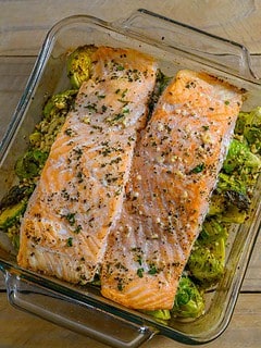 Garlic Roasted Salmon and Brussels Sprouts in a baking dish.