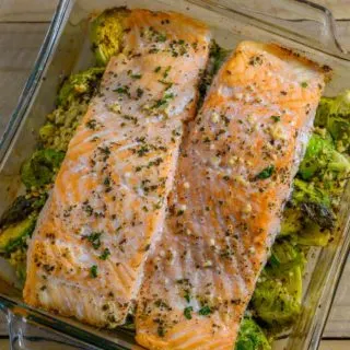 Garlic Roasted Salmon and Brussels Sprouts in a baking dish.