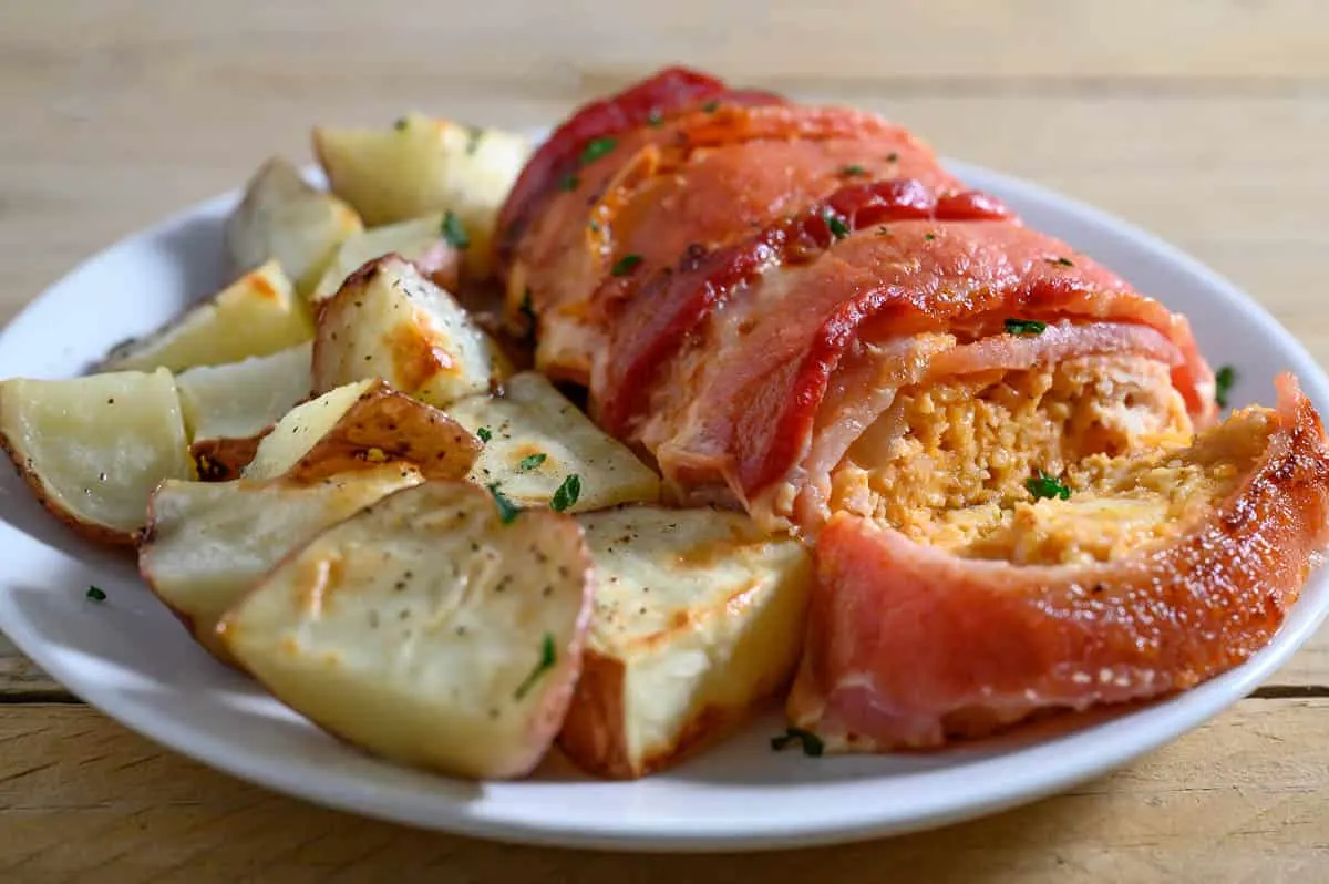 Italian Chicken Meatloaf and potatoes on a plate.