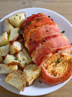 Chicken and Bacon Meatloaf and potatoes on a plate.