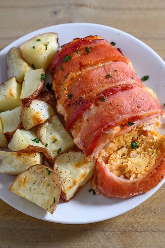 Chicken and Bacon Meatloaf and potatoes on a plate.