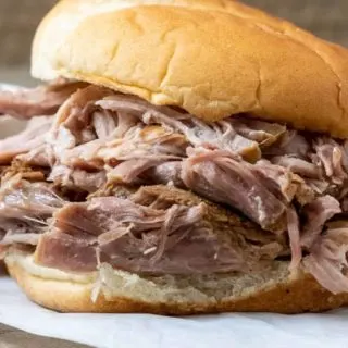 3 Ingredient Hawaiian Pulled Pork piled high on a bun.