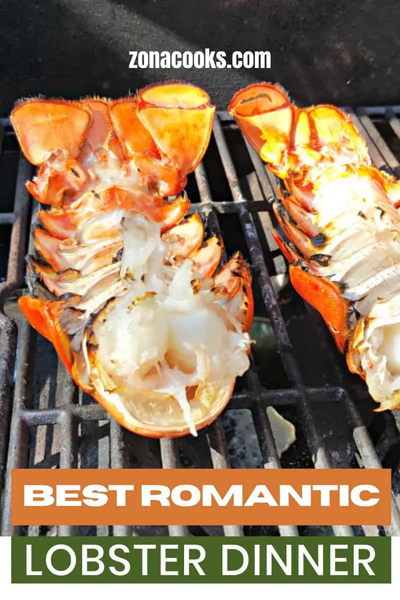 two lobster tails upside down cooking on a grill.