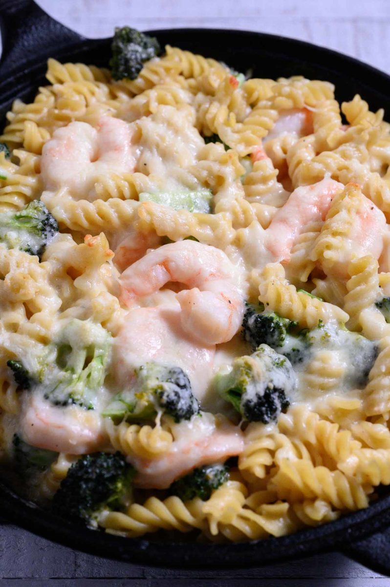 Baked Shrimp Broccoli Pasta in a cast iron skillet.