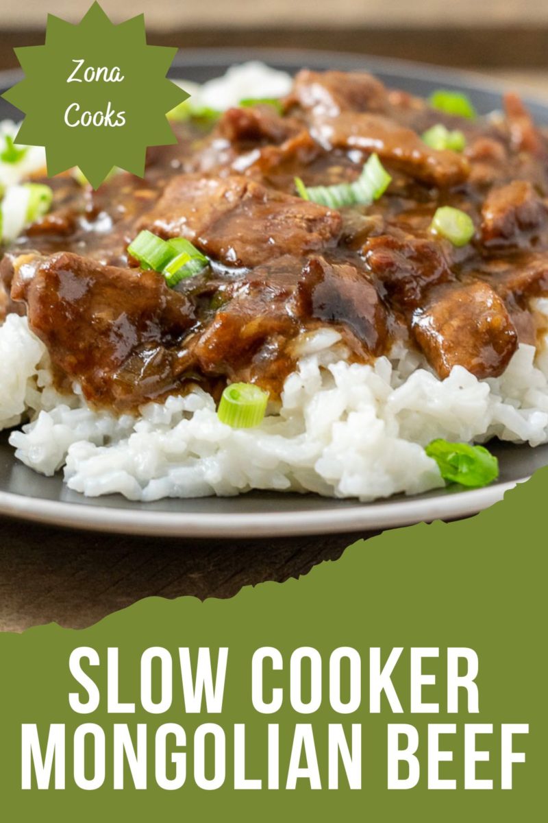 Slow Cooker Mongolian Beef over rice on a plate.