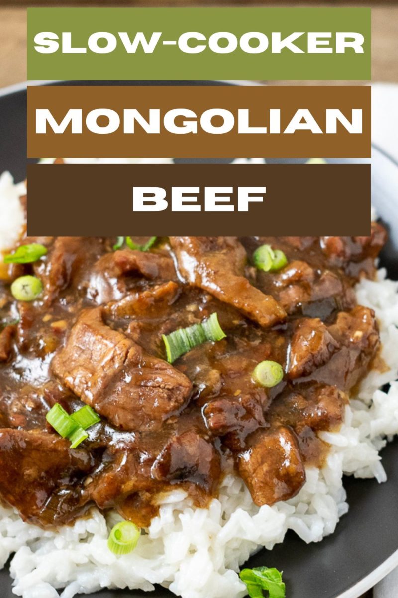 Slow-Cooker Mongolian Beef over rice on a plate.