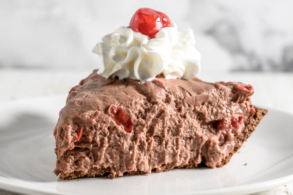 5 Ingredient No Bake Cheesecake slice on a plate.