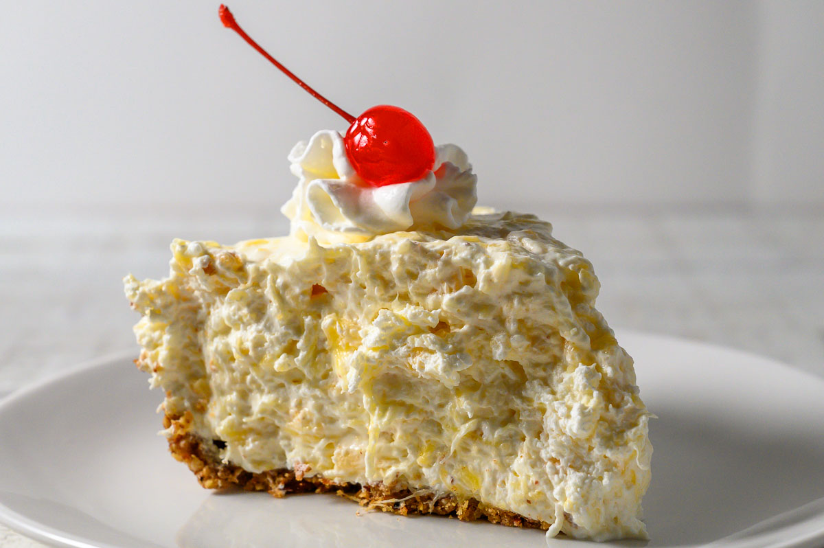 5 Ingredient Pineapple Pie slice on a plate.