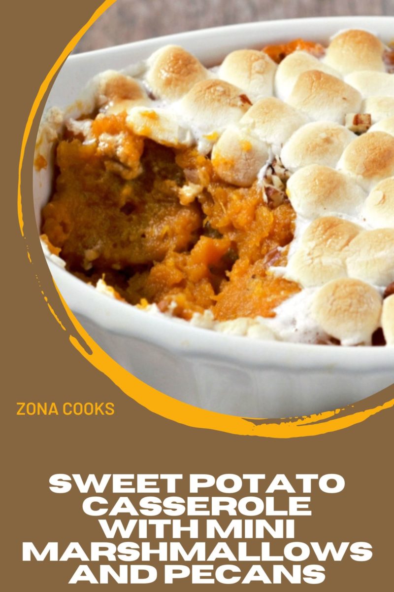 Sweet Potato Casserole with Mini Marshmallows and Pecans in a baking dish.