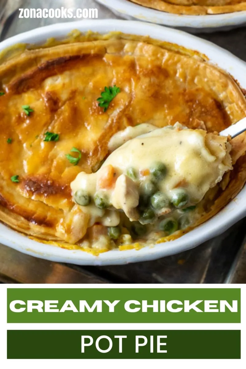 Best Chicken Pot Pie with a spoon lifting some out.