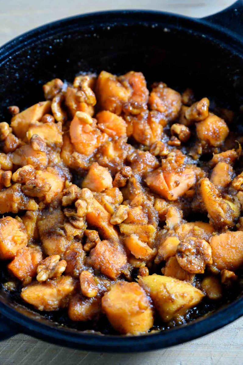 5 Ingredient Candied Sweet Potatoes in a cast iron skillet.
