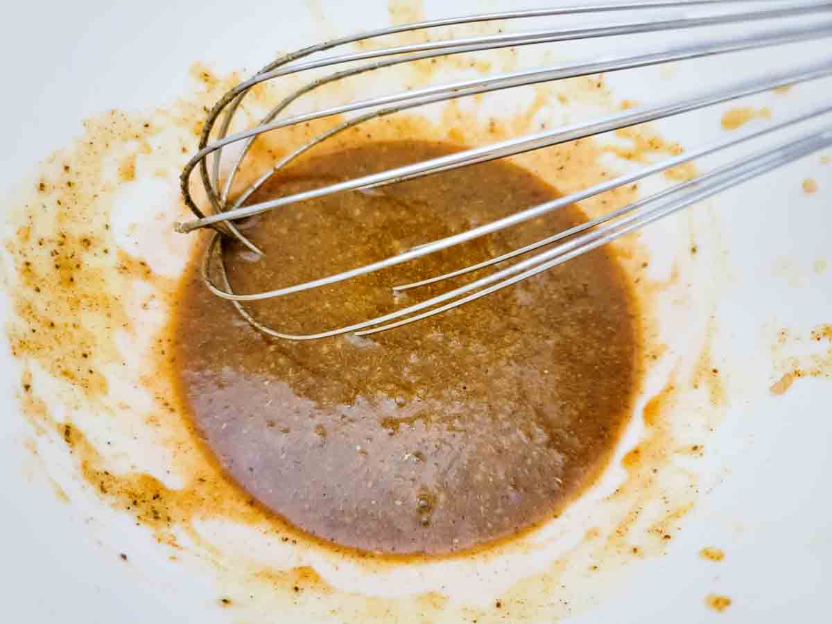 honey, butter, Old Bay seasoning, garlic, and ginger whisked in a medium bowl.