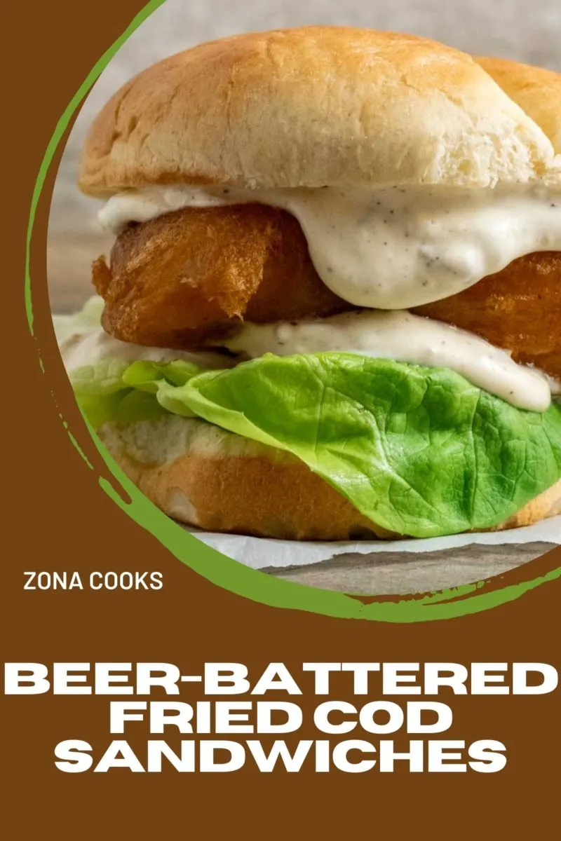 Beer-battered Fried Cod Sandwiches on parchment paper.
